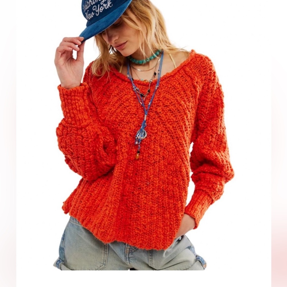 Free People in a swirl Knit Sweater. Medium